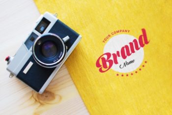 Free Logo Plus Camera Mockup in PSD