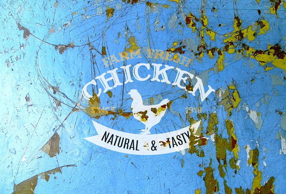 Damaged Painted Wall Logo