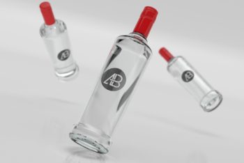 Free Realistic Vodka Bottles Scene Mockup in PSD