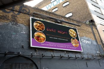 Free Billboard PSD Mockup for Outdoor Advertising on Urban Buildings